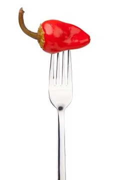 Red pepper on a fork Stock Photos
