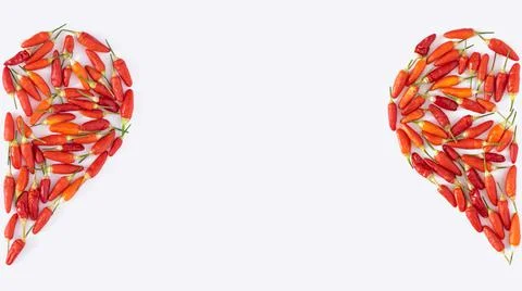 Red pepper heart split in  half Stock Photos