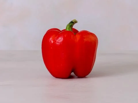 Red pepper one, light background, photo straight on. peppers are vitamin C,.. Stock Photos