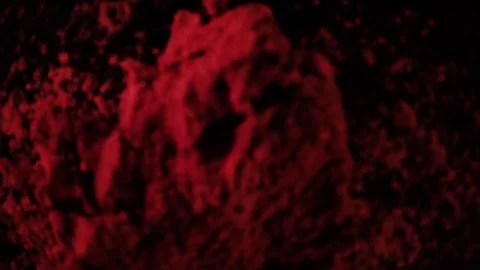 Red pepper powder drops down. Slow motion, top view Stock Footage 74414222