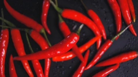 Red pepper rotates on a background of red pepper. Stock Footage 112595648