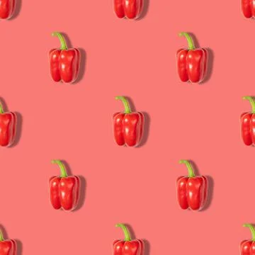 Red pepper seamless pattern on a red background. Vegetable pattern  Stock Photos