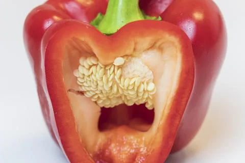 Red pepper with slice where you can see the detail of the structure of the .. Stock Photos