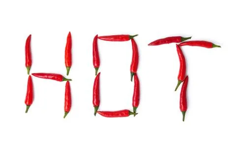 Red pepper spelling hot Stock Photos