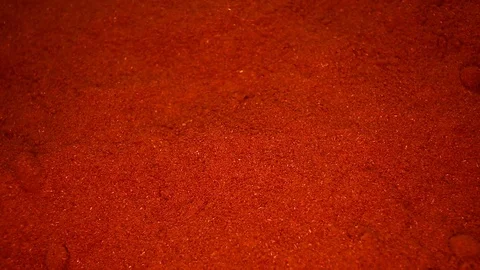 Red Pepper Spice Powder Closeup Texture on Rotating Plate Stock Footage 113197909