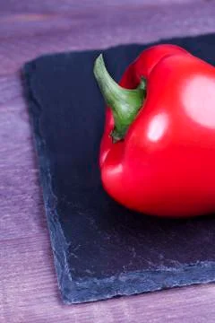 Red pepper on a stone tray Stock Photos