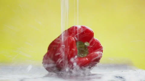 Red pepper on the table under the drops of water. Stock Footage 114440691