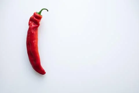 Red pepper on white background. flat lay Stock Photos