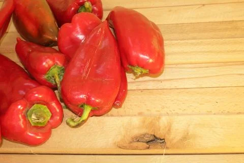 Red pepper on a wooden table Stock Photos