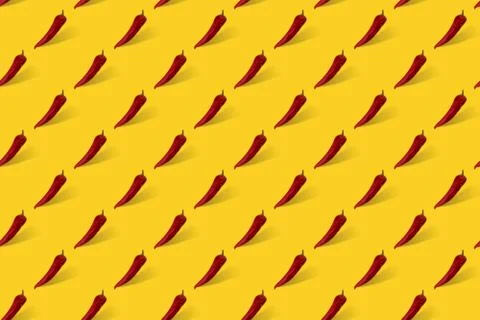 Red pepper on yellow seamless pattern. Stock Photos