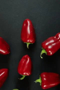 Red peppers on black background 写真素材