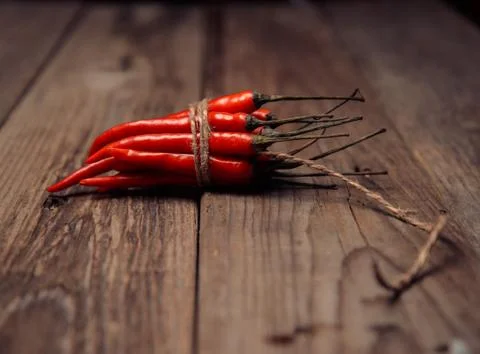 Red peppers in a bunch Stock Photos