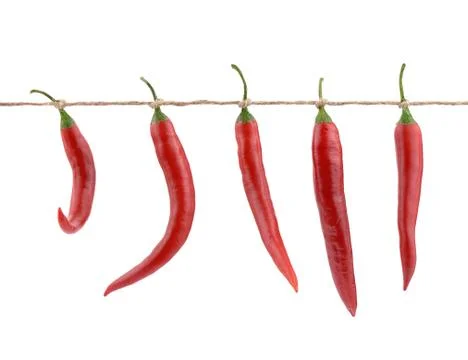 Red peppers hanging on a string Foto stock