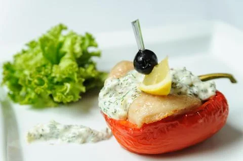 Red peppers stuffed with meat. Stock Photos