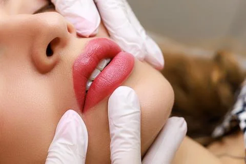 Red permanent lip makeup Stock Photos