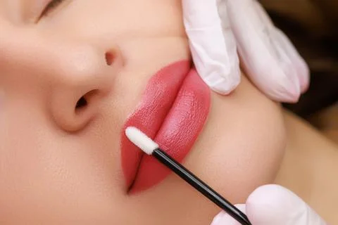 Red permanent lip makeup Foto stock