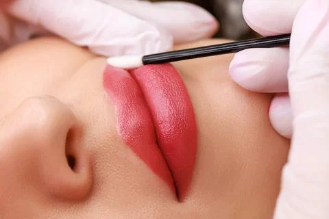 Red permanent lip makeup Stock Photos