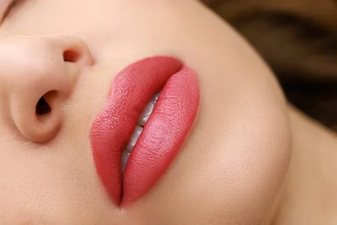 Red permanent lip makeup Stock Photos