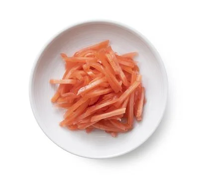 Red pickled ginger on a white background Stock Photos