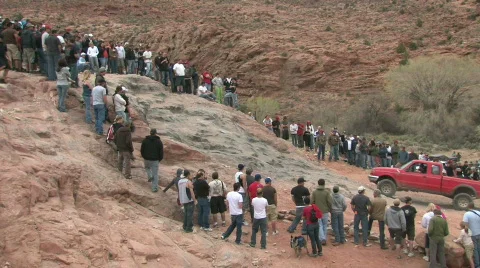 Red pickup crawls up rocks in Moab M HD Stock-Footage 365368