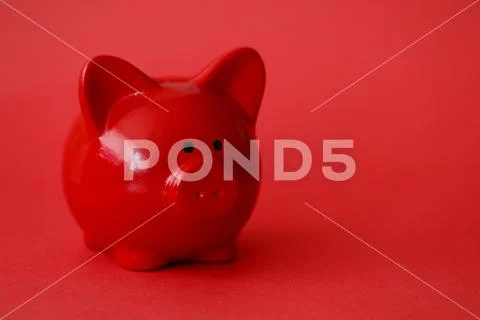 Red piggy box background. Fast banking credit Stock Photos