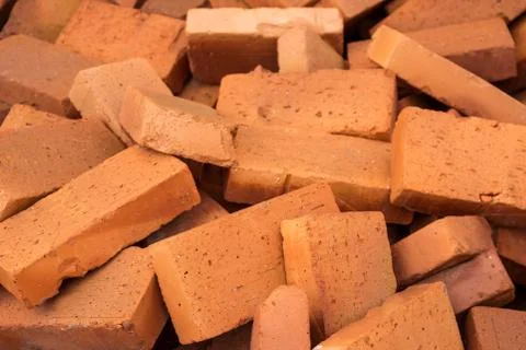 Red pile of bricks for construction site Stock Photos