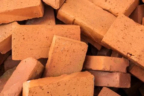 Red pile of bricks for construction site 스톡 사진