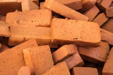 Red pile of bricks for construction site Stock Photos