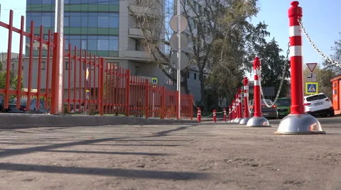 The red pillars connected by a chain. Parking. Video stock 55271736