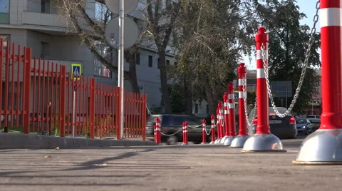 The red pillars connected by a chain. Parking. Video stock 55271889