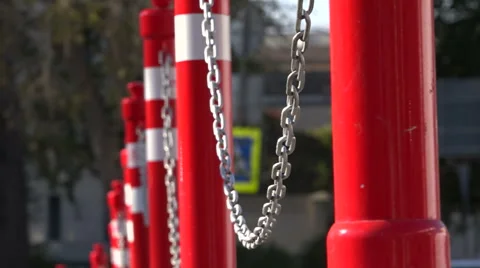 The red pillars connected by a chain. Parking. Stock Footage