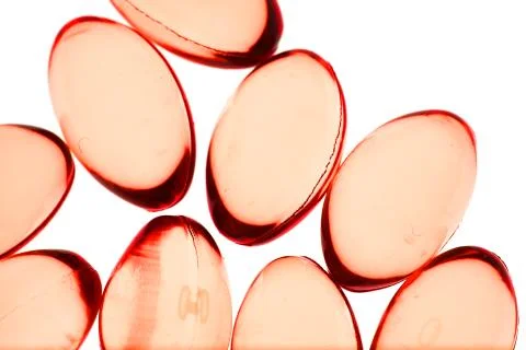 Red pills isolated background Stock Photos