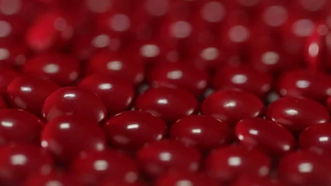 Red pills onTurntable Stock Footage 250083721
