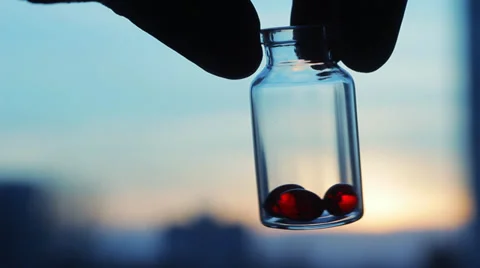 Red Pills Vitamin E Capsules in Glass Bottle against Sunset Sky, #1 Pharmacy HD Stock Footage 34491165