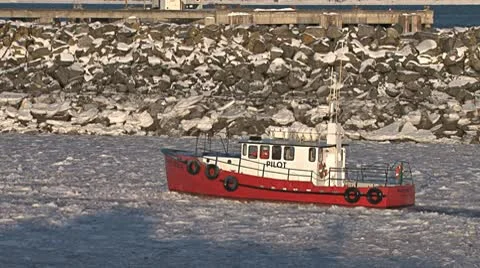 Red Pilot Boat Returning to Icy Harbor 2 Stock Footage 10588934