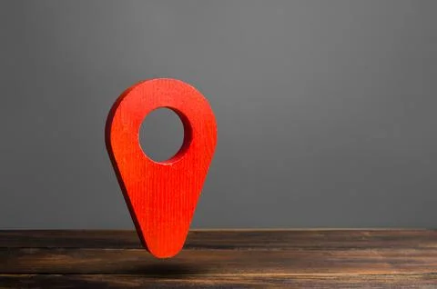 Red pin pointer location on a gray background. Concept of navigation. Touri.. Stock Photos