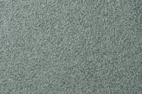 Red Pink Granite Texture with Dense Fine Dark Mineral Grain Stock Photos