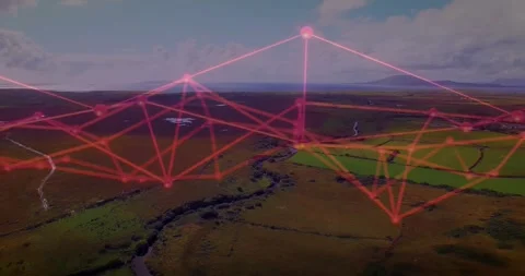 Red-pink network overlay emerging on aerial reveal, animating nodes into peaks Stock Footage 330981193