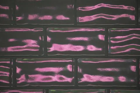 Red-pink reflection of the sun in ceramic tiles Stock Photos