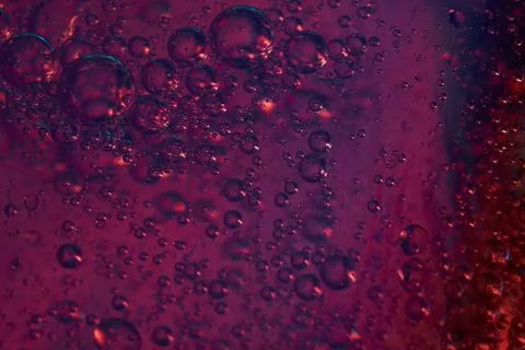 Red pink rising bubbles in different sizes Stock Photos