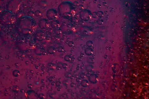 Red pink rising bubbles in different sizes Stock Photos
