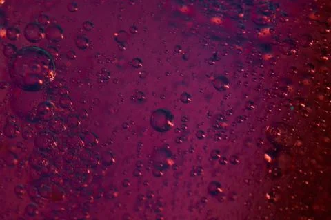 Red pink rising bubbles in different sizes Stock Photos