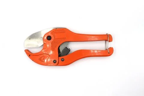 Red Pipe Cutting design, scissors for cutting plastic pipe isolated on white  Stock Photos
