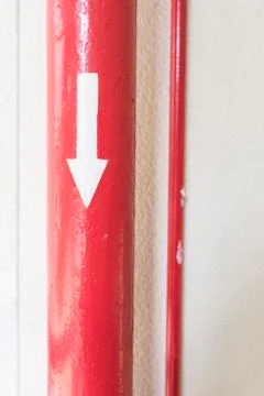 Red Pipe with Directrion Stock Photos