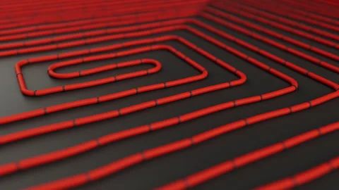 Red pipes on dark floor. Construction of underfloor heating system. Animation of Stock Footage 317306746