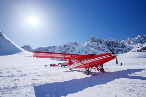 Red plane on glacier Stock Photos