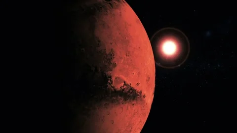 Red planet in deep space with a bright star glowing behind it, showing a da.. Stock Footage 340389269