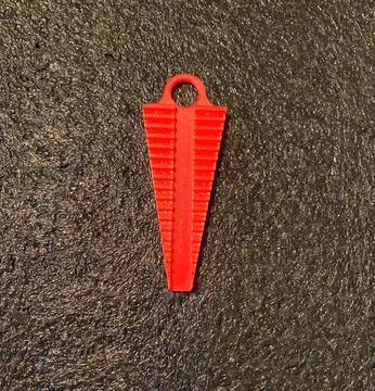 Red plastic 3D printed bending jig tool for shaping electronic component lead Stock Photos