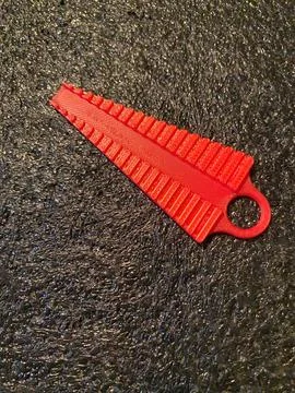 Red plastic 3D printed bending jig tool for shaping electronic component lead Stock Photos