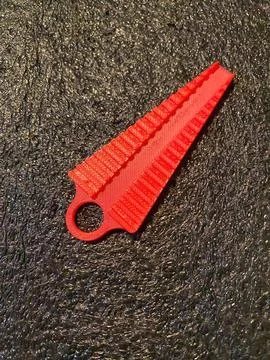 Red plastic 3D printed bending jig tool for shaping electronic component lead Stock Photos